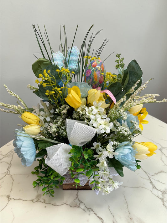 Easter Spring Faux Floral Arrangement with Bow Centerpiece Decoration featuring Yellow, Light Blue and Greens.