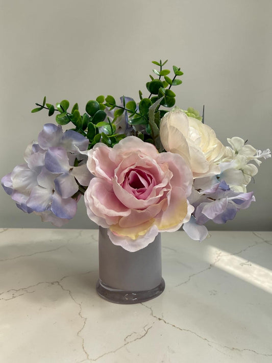 Faux Floral Arrangement in Gray Glass Jar, Pink, Purple, Blue and White Silk Roses and Hydrangeas, 10 inch x 11 Inch